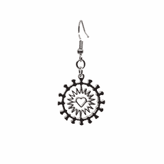 Close-up of Indie Ovation Corona Heart earrings in stainless steel, 1-inch geometric heart and corona design