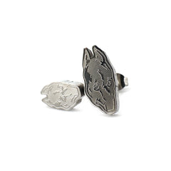 Compact 0.5-inch stainless steel stud earrings inspired by Death Grips' groundbreaking album The Money Store, perfect for fans of music merch.