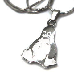 Detailed view of Linux Tux mascot pendant necklace in polished stainless steel