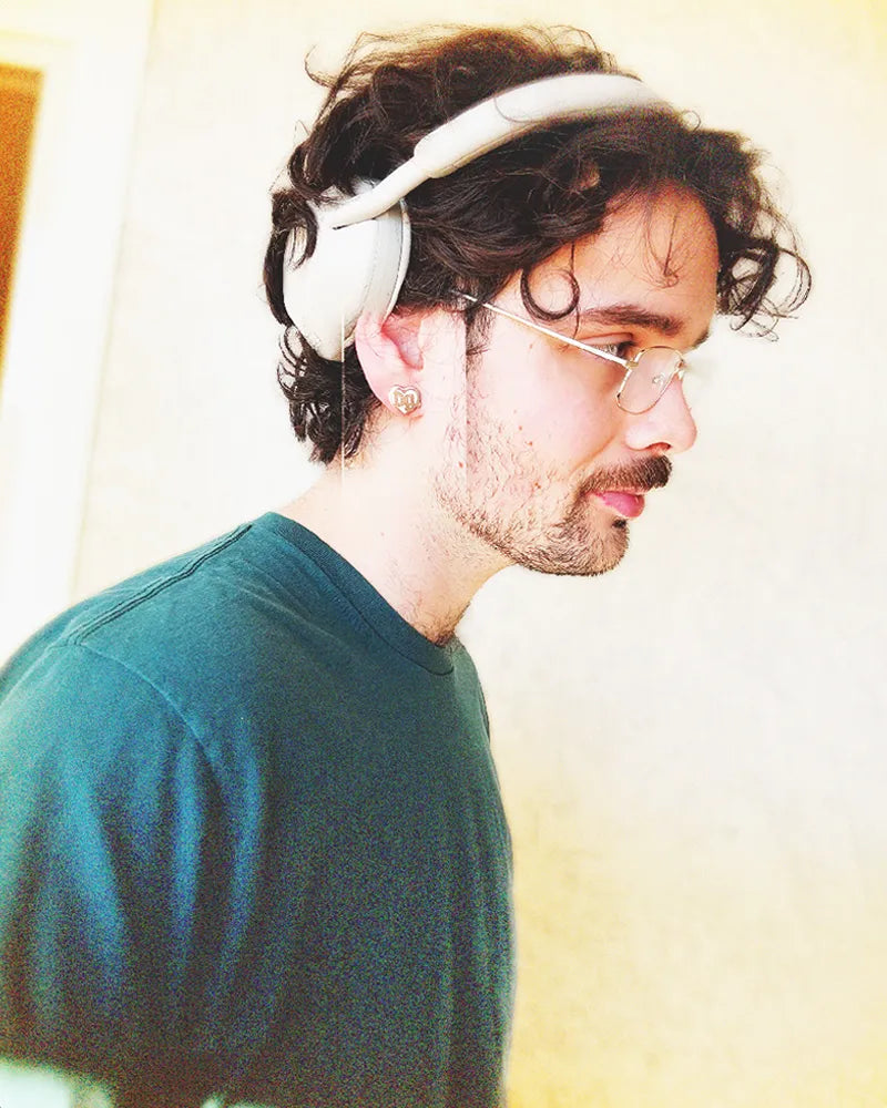 Man wearing a 0.5-inch stainless steel earring inspired by Drain Gang