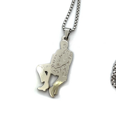 Kid Cudi Fan-Made "Man on the Moon: Mr. Rager" Pendant Chain Necklace, the perfect accessory for any Kid Cudi fan. Expertly crafted with a unique design, this necklace celebrates the memorable "Man on the Moon: Mr. Rager" album.