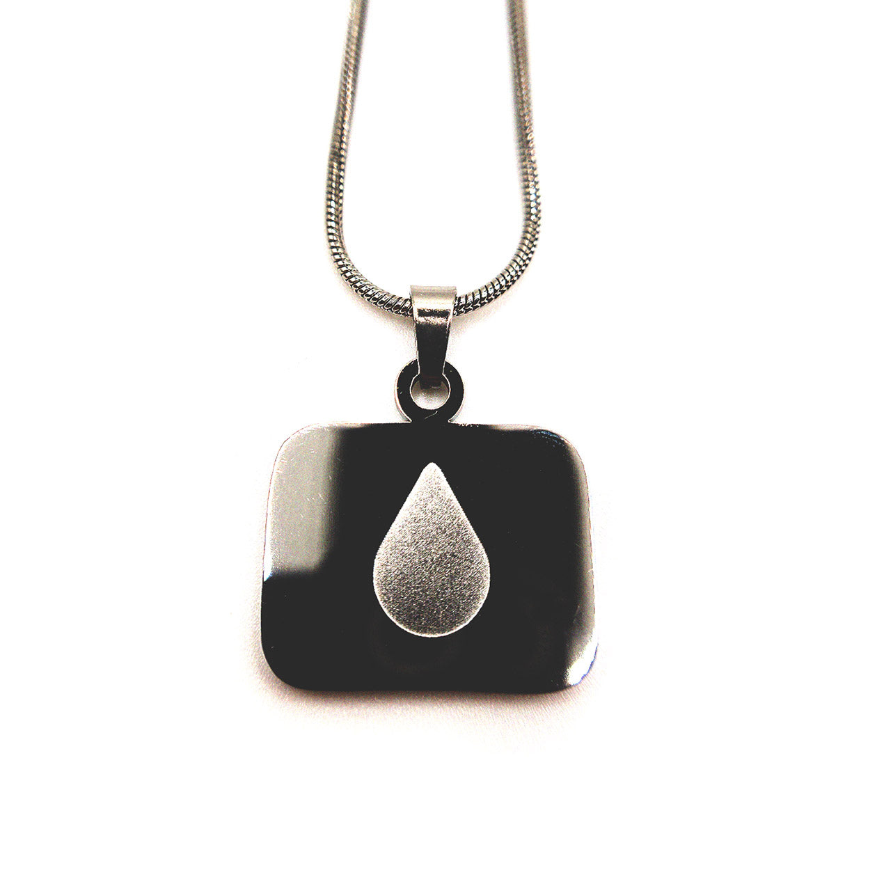 Stainless steel necklace featuring the Lumon tear logo from Severance on a rounded square pendant