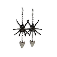 Close-up of Indie Ovation Spider & Fly earrings in stainless steel, 1.25-inch engraved gothic design