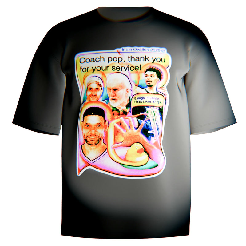 White and black Comfort Colors tees with a colorful collage of Coach Popovich, Tim Duncan, Manu Ginobili, and Victor Wembanyama, featuring a raised hand and rubber duck in a surreal, vintage-style tribute to the Spurs dynasty.