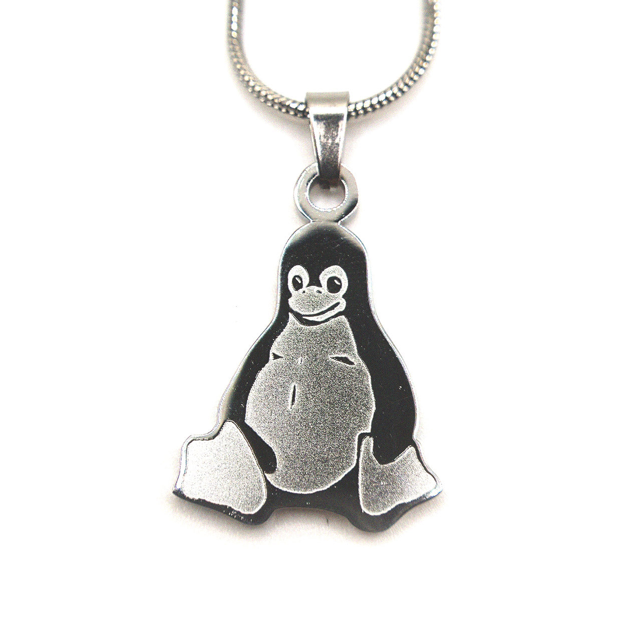 Stainless steel necklace with Tux the Linux penguin pendant on a chain, product photo on white background