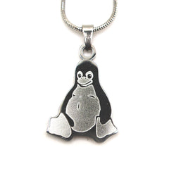 Stainless steel necklace with Tux the Linux penguin pendant on a chain, product photo on white background
