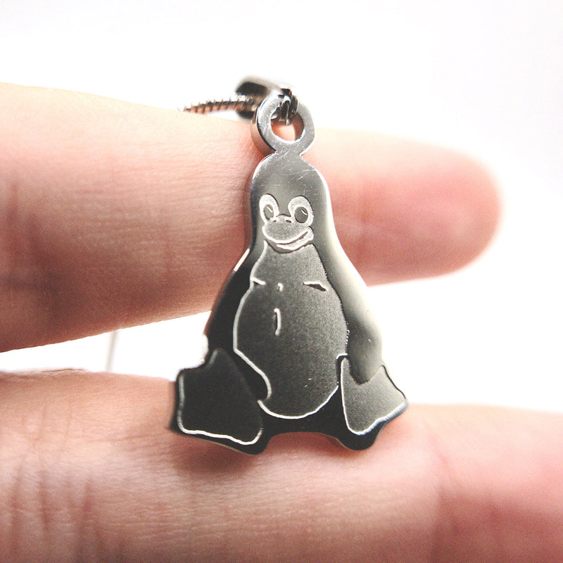 Front-facing photo of Tux the penguin stainless steel necklace on a chain