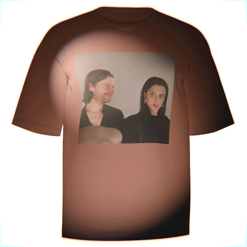 Flat-lay of a red Aphex Twin Arca T-Shirt featuring a direct-to-garment print of Arca and Richard D. James' iconic selfie. Made from soft, breathable Comfort Colors 100% ringspun cotton. Perfect gift for fans of electronic music artists Aphex Twin and Arca.

