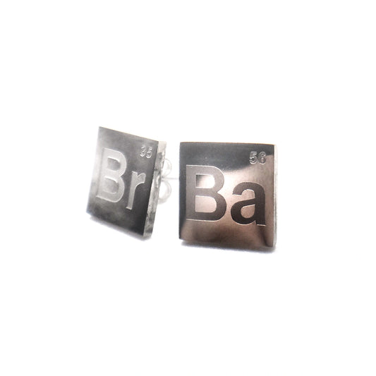 Silver steel stud earrings with elements "Br" and "Ba" referencing breaking bad