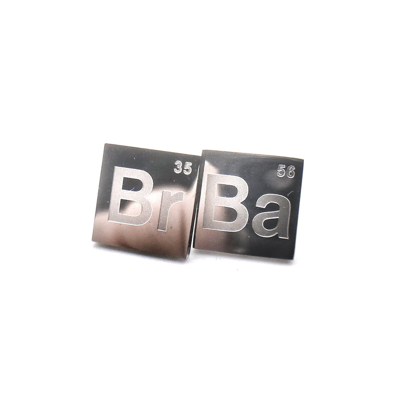 Silver steel stud earrings with elements "Br" and "Ba" referencing breaking bad