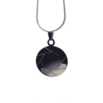 Spinning gif of a stainless steel aperture science logo necklace from Portal 2