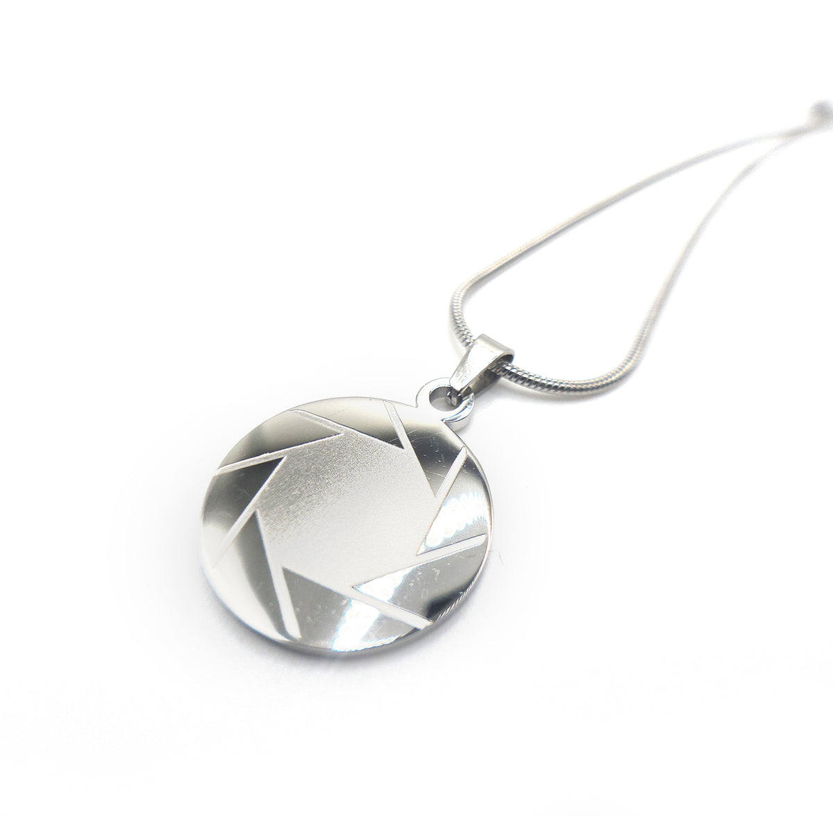 Silver geometric portal 2 aperture pendant necklace on a white background